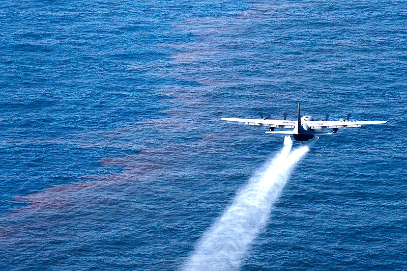 A C-130 Hercules drops an oil-dispersing chemical into the Gulf of Mexico